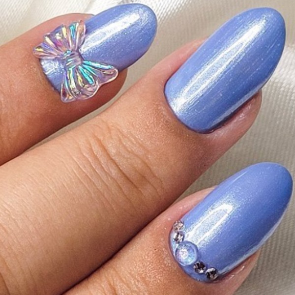 Coquette Nails: invista na nova tendência de unhas com lacinho